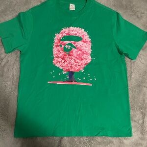 Green Graphic Tee with Pink Tree Design